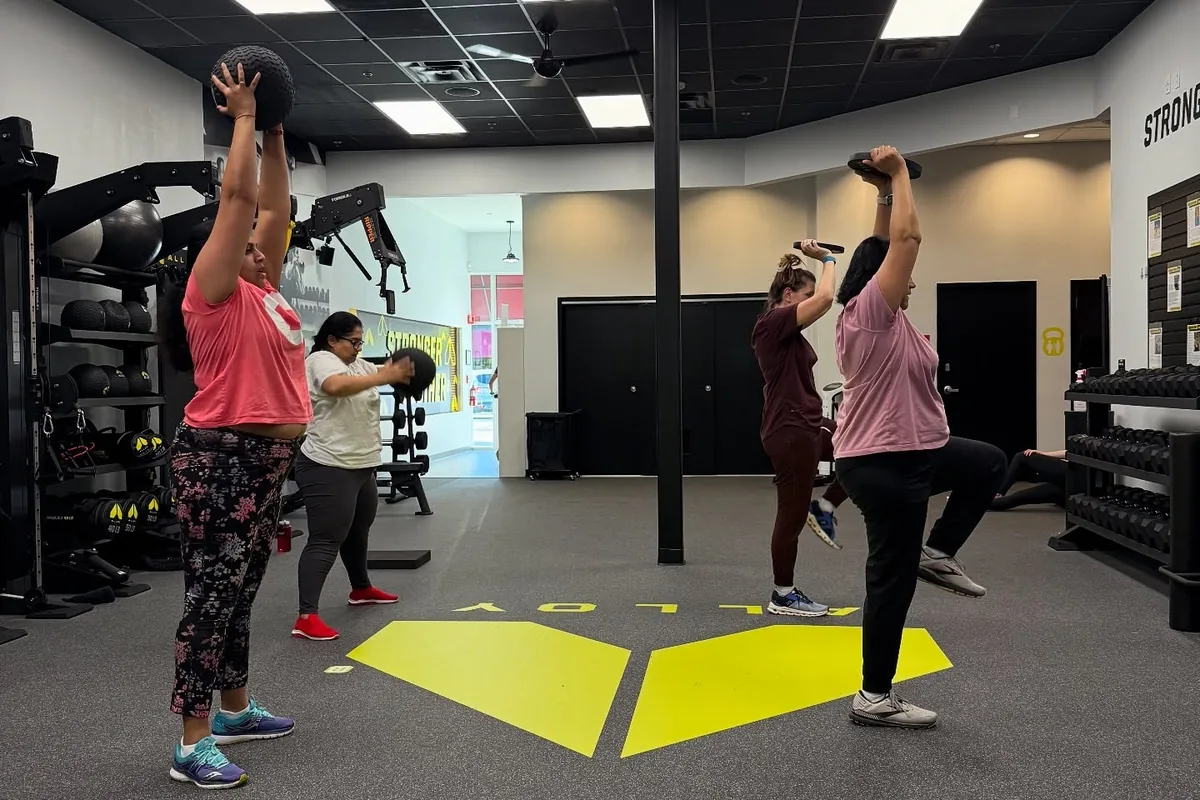 Small group strength session in progress at Alloy Personal Training Cary