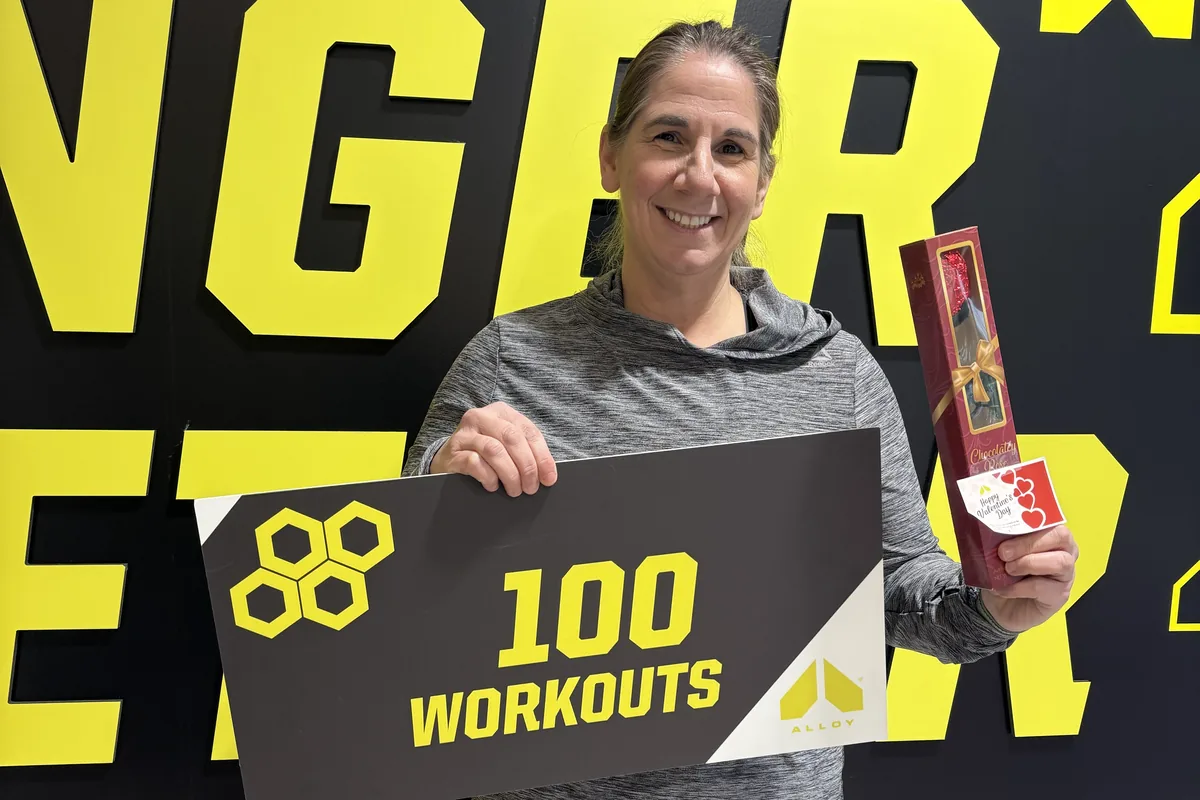 Alloy Cary member celebrating 100 workouts
